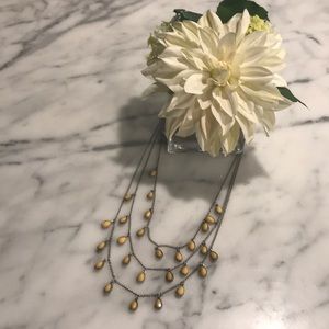 Silver and yellow long beaded dangle necklace.